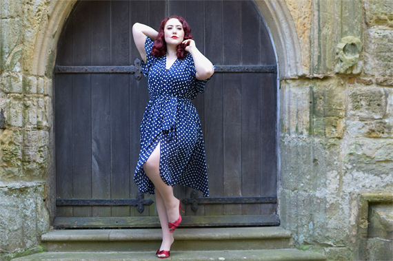 plus sized pinup fit review by Miss Amy May of the Navy Polka Dot Flutter Sleeve Claudia dress by Alexandra King for Deadly is the Female