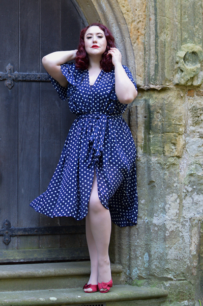 plus sized pinup fit review by Miss Amy May of the Navy Polka Dot Flutter Sleeve Claudia dress by Alexandra King for Deadly is the Female