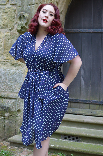 plus sized pinup fit review by Miss Amy May of the Navy Polka Dot Flutter Sleeve Claudia dress by Alexandra King for Deadly is the Female