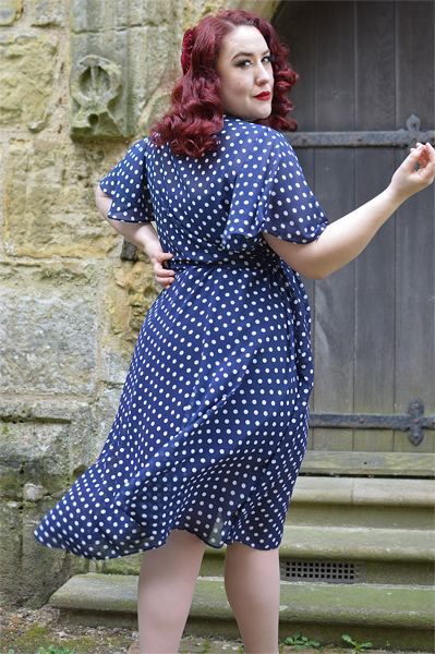plus sized pinup fit review by Miss Amy May of the Navy Polka Dot Flutter Sleeve Claudia dress by Alexandra King for Deadly is the Female
