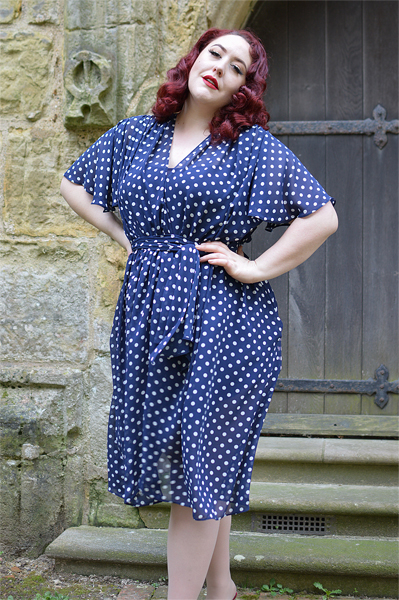 plus sized pinup fit review by Miss Amy May of the Navy Polka Dot Flutter Sleeve Claudia dress by Alexandra King for Deadly is the Female