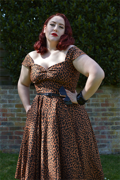 Plus size pinup Miss Amy May wears the Leopard Print Scarlett dress by Alexandra King for Deadly is the Female for a fit size review