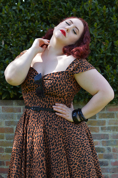Plus size pinup Miss Amy May wears the Leopard Print Scarlett dress by Alexandra King for Deadly is the Female for a fit size review