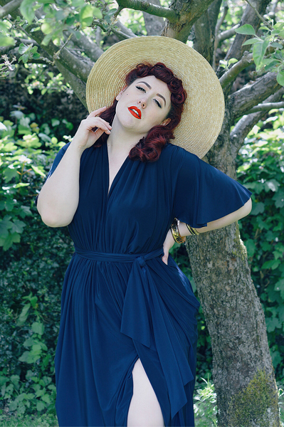 Plus size pinup Miss Amy May reviews the Navy Flutter Sleeve Claudia dress by Alexandra King for Deadly is the Female, including fit and size details