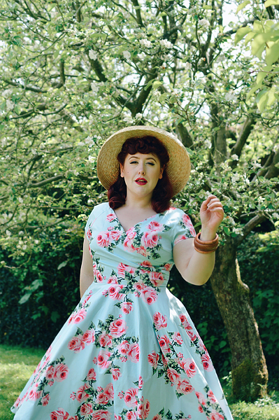 Plus sized pinup Miss Amy May writes a fit and size review of the Blue Vintage Rose Hourglass swing dress gifted by The Pretty Dress Company