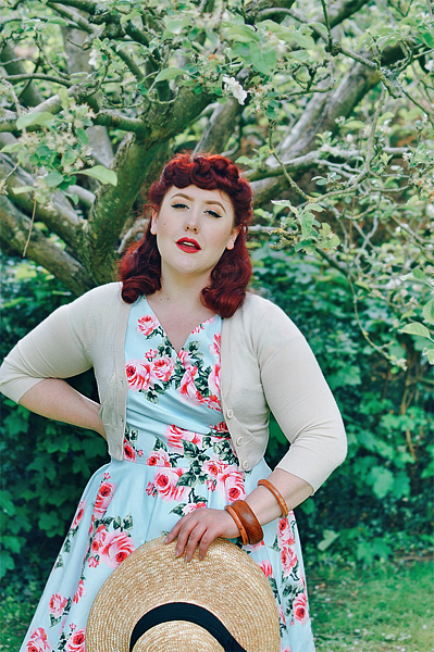 Plus sized pinup Miss Amy May writes a fit and size review of the Blue Vintage Rose Hourglass swing dress gifted by The Pretty Dress Company