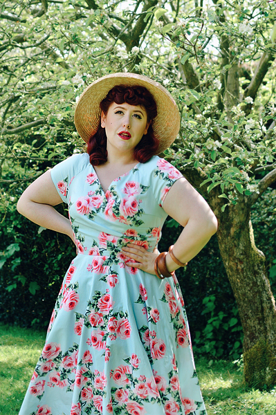 Plus sized pinup Miss Amy May writes a fit and size review of the Blue Vintage Rose Hourglass swing dress gifted by The Pretty Dress Company