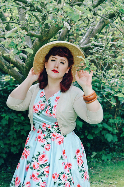 Plus sized pinup Miss Amy May writes a fit and size review of the Blue Vintage Rose Hourglass swing dress gifted by The Pretty Dress Company