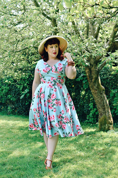 Plus sized pinup Miss Amy May writes a fit and size review of the Blue Vintage Rose Hourglass swing dress gifted by The Pretty Dress Company
