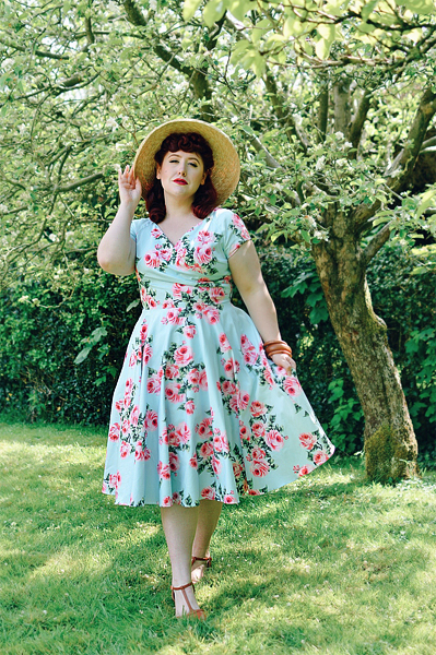 Plus sized pinup Miss Amy May writes a fit and size review of the Blue Vintage Rose Hourglass swing dress gifted by The Pretty Dress Company
