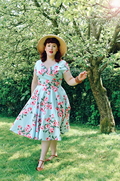 Plus sized pinup Miss Amy May writes a fit and size review of the Blue Vintage Rose Hourglass swing dress gifted by The Pretty Dress Company