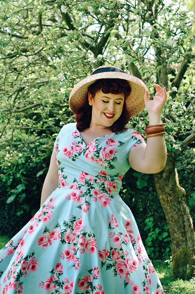 Plus sized pinup Miss Amy May writes a fit and size review of the Blue Vintage Rose Hourglass swing dress gifted by The Pretty Dress Company