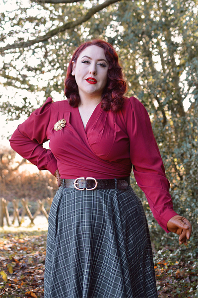 Plus size pinup Miss Amy May models the Rock'n'Romance Darla Wrap blouse in wine for her fit review