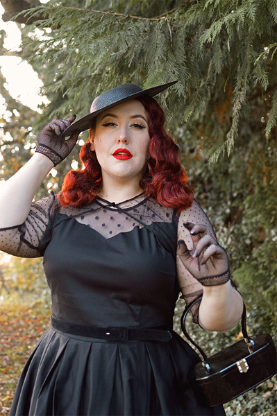 fit and size review by plus size pinup Miss Amy May of the Elizabeth black dress gifted by Dolly & Dotty 