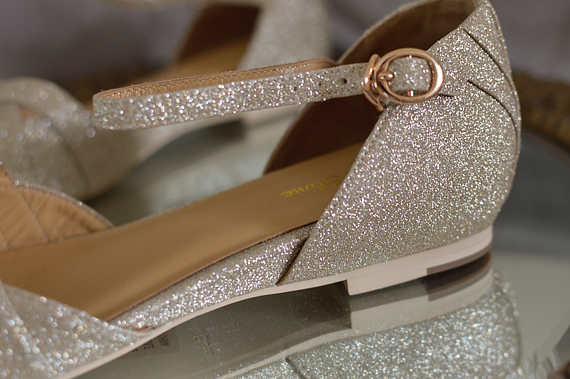 Plus size pinup Miss Amy May models  the champagne glitter Manhattan flats by Charlie Stone Shoes