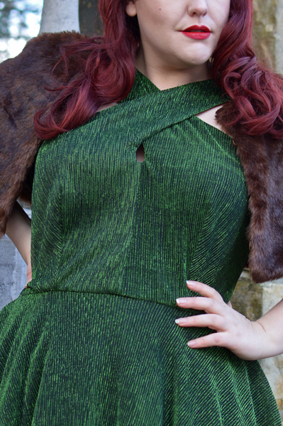 Plus size pinup Miss Amy May modelling the Emerald Metallic Ribbed Valentina swing dress gifted by Unique Vintage for a fit and sizing review