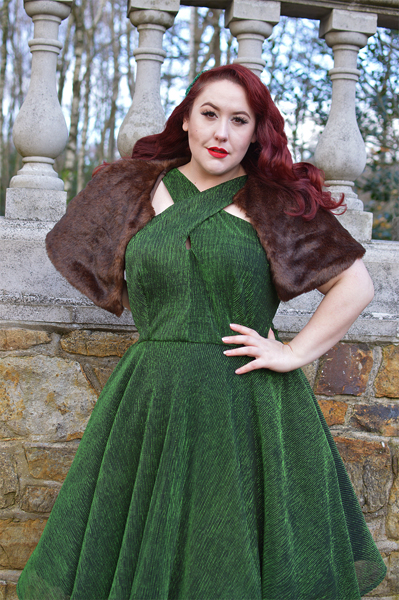 Plus size pinup Miss Amy May modelling the Emerald Metallic Ribbed Valentina swing dress gifted by Unique Vintage for a fit and sizing review