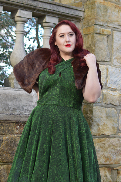 Plus size pinup Miss Amy May modelling the Emerald Metallic Ribbed Valentina swing dress gifted by Unique Vintage for a fit and sizing review