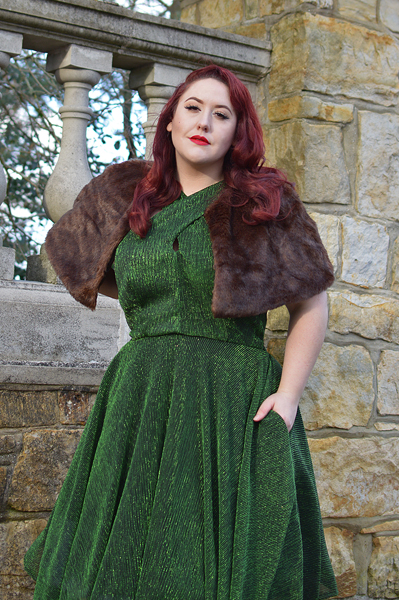 Plus size pinup Miss Amy May modelling the Emerald Metallic Ribbed Valentina swing dress gifted by Unique Vintage for a fit and sizing review