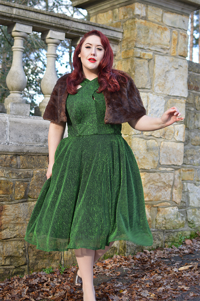 Plus size pinup Miss Amy May modelling the Emerald Metallic Ribbed Valentina swing dress gifted by Unique Vintage for a fit and sizing review
