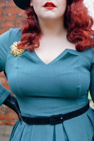 Plus size pinup Miss Amy May models the teal Parinita-Sento dress gifted by Miss Candyfloss for a fit and size review