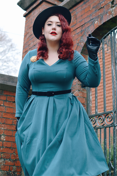 Plus size pinup Miss Amy May models the teal Parinita-Sento dress gifted by Miss Candyfloss for a fit and size review