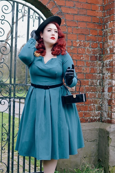 Plus size pinup Miss Amy May models the teal Parinita-Sento dress gifted by Miss Candyfloss for a fit and size review