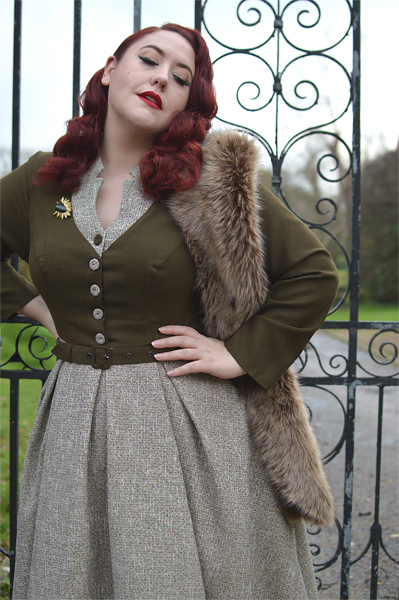 Plus size pinup Miss Amy May models the Tamrika-Sand dress gifted by Miss Candyfloss for a fit and size review
