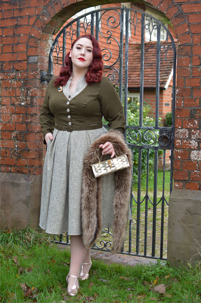 Plus size pinup Miss Amy May models the Tamrika-Sand dress gifted by Miss Candyfloss for a fit and size review
