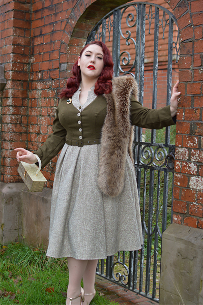 Plus size pinup Miss Amy May models the Tamrika-Sand dress gifted by Miss Candyfloss for a fit and size review