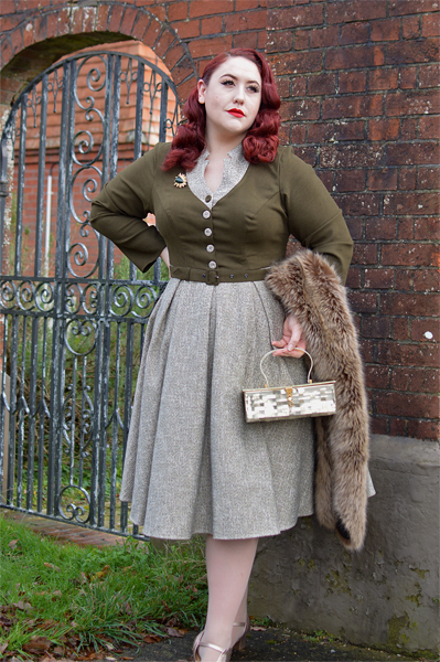 Plus size pinup Miss Amy May models the Tamrika-Sand dress gifted by Miss Candyfloss for a fit and size review