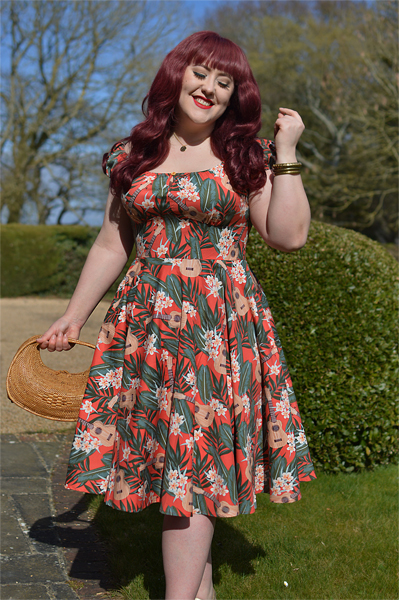Plus size pinup Miss Amy May models the Ukulele 50s dress gifted by Hell Bunny for a fit and size review