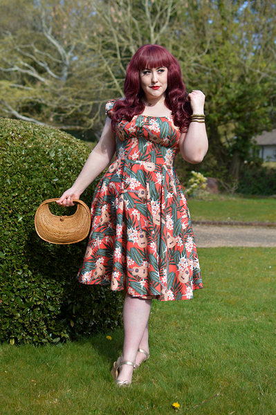 Plus size pinup Miss Amy May models the Ukulele 50s dress gifted by Hell Bunny for a fit and size review