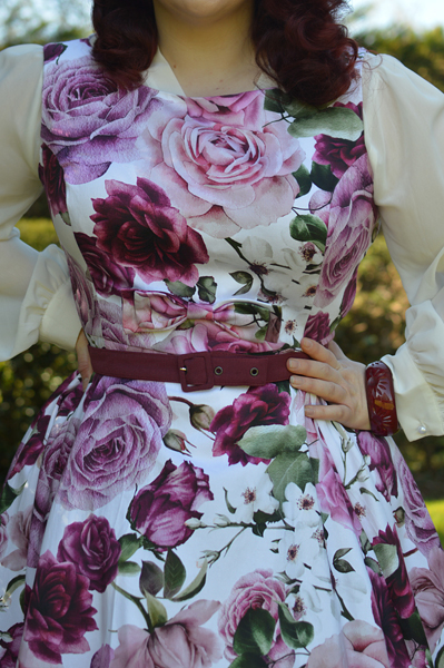 Plus size pinup Miss Amy May models the Alice Floral Swing dress gifted by Hearts and Roses London for a fit and size review