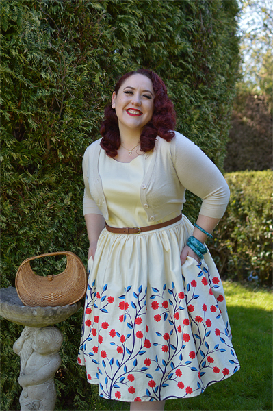 Plus size pinup Miss Amy May modelling the Candice Danube floral swing dress gifted by Collectif Clothing for a fit and size review