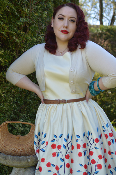 Plus size pinup Miss Amy May modelling the Candice Danube floral swing dress gifted by Collectif Clothing for a fit and size review