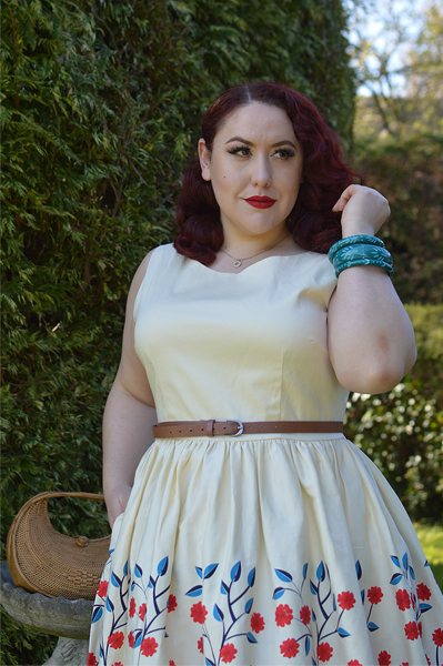 Plus size pinup Miss Amy May modelling the Candice Danube floral swing dress gifted by Collectif Clothing for a fit and size review