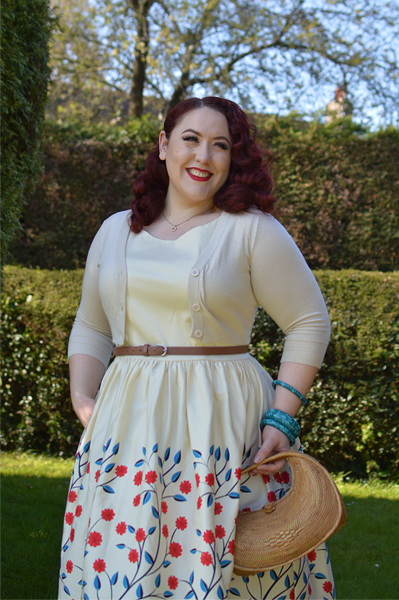 Plus size pinup Miss Amy May modelling the Candice Danube floral swing dress gifted by Collectif Clothing for a fit and size review