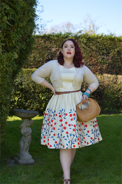 Plus size pinup Miss Amy May modelling the Candice Danube floral swing dress gifted by Collectif Clothing for a fit and size review