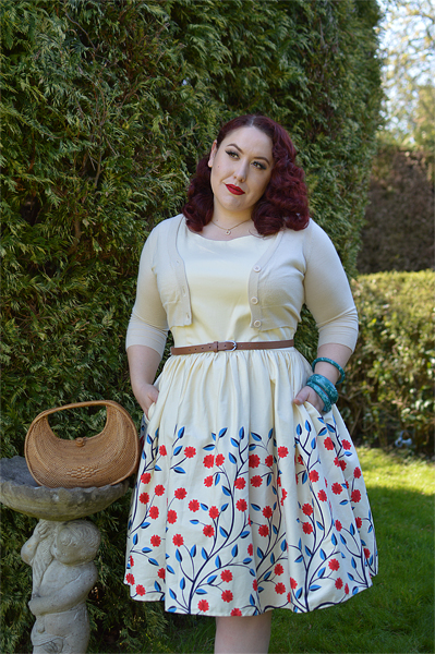 Plus size pinup Miss Amy May modelling the Candice Danube floral swing dress gifted by Collectif Clothing for a fit and size review