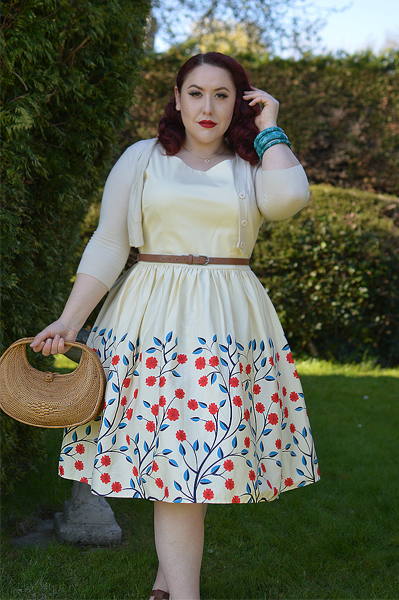 Plus size pinup Miss Amy May modelling the Candice Danube floral swing dress gifted by Collectif Clothing for a fit and size review
