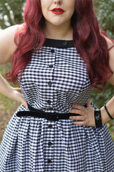 Plus size pinup Miss Amy May models the Black gingham Maxine dress by Unique Vintage for a fit and sizing review