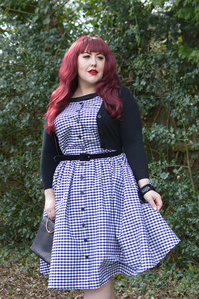 Plus size pinup Miss Amy May models the Black gingham Maxine dress by Unique Vintage for a fit and sizing review