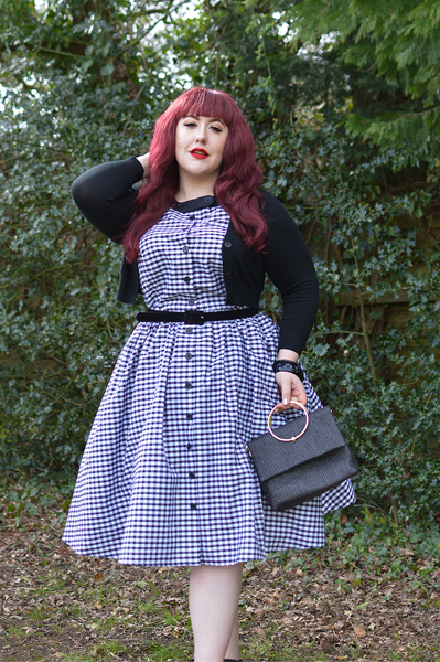 Plus size pinup Miss Amy May models the Black gingham Maxine dress by Unique Vintage for a fit and sizing review