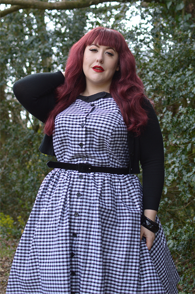 Plus size pinup Miss Amy May models the Black gingham Maxine dress by Unique Vintage for a fit and sizing review