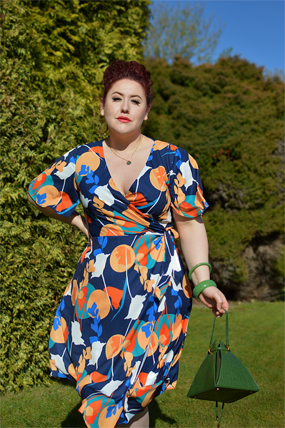 Plus size pinup Miss Amy May models the Abstract Print Midi Wrap Day Dress by Chi Chi London for a fit and sizing review