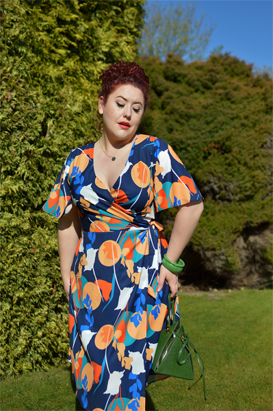 Plus size pinup Miss Amy May models the Abstract Print Midi Wrap Day Dress by Chi Chi London for a fit and sizing review