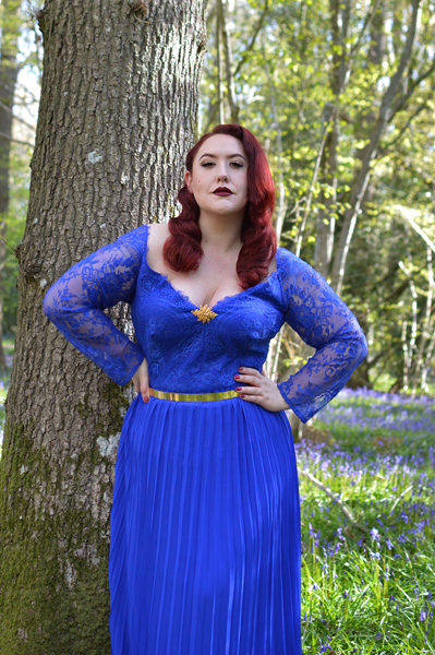 Plus size pinup Miss Amy May models the Blue Lace Sleeve Maxi Bridesmaid dress gifted by Chi Chi London for a fit and size review