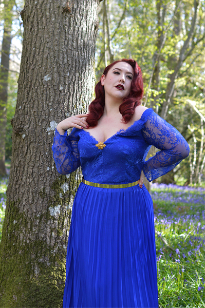 Plus size pinup Miss Amy May models the Blue Lace Sleeve Maxi Bridesmaid dress gifted by Chi Chi London for a fit and size review