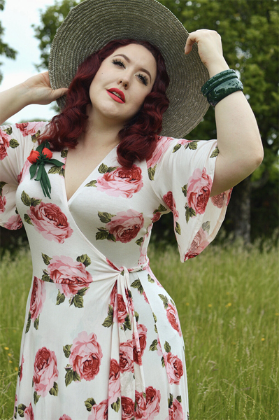 Plus size pinup Miss Amy May models the Rose Cream Aurora Dress gifted by Wax Poetic Clothing for a fit and size review